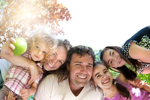 Family staring down at camera