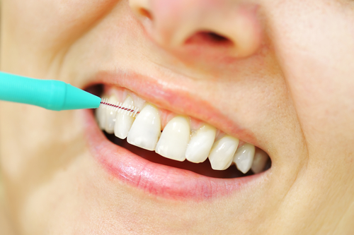 Tooth picking with tool